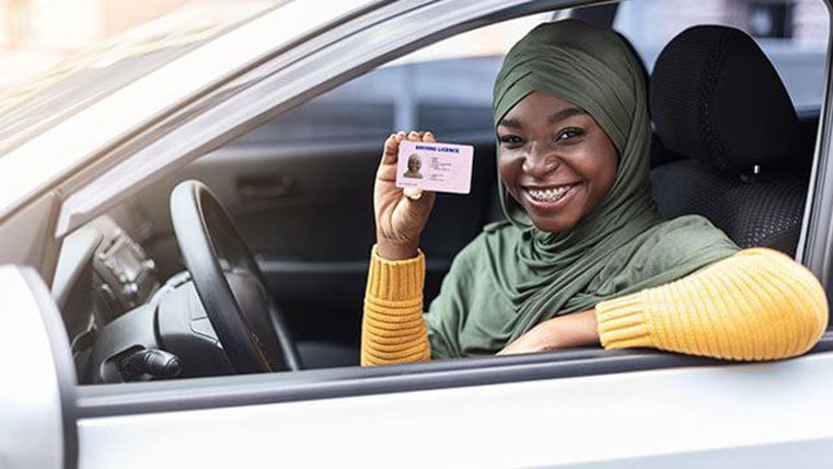 Student practicing parking with a behind-the-wheel instructor