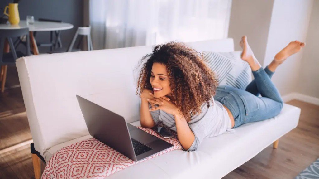 California student studying drivers ed on a laptop at home
